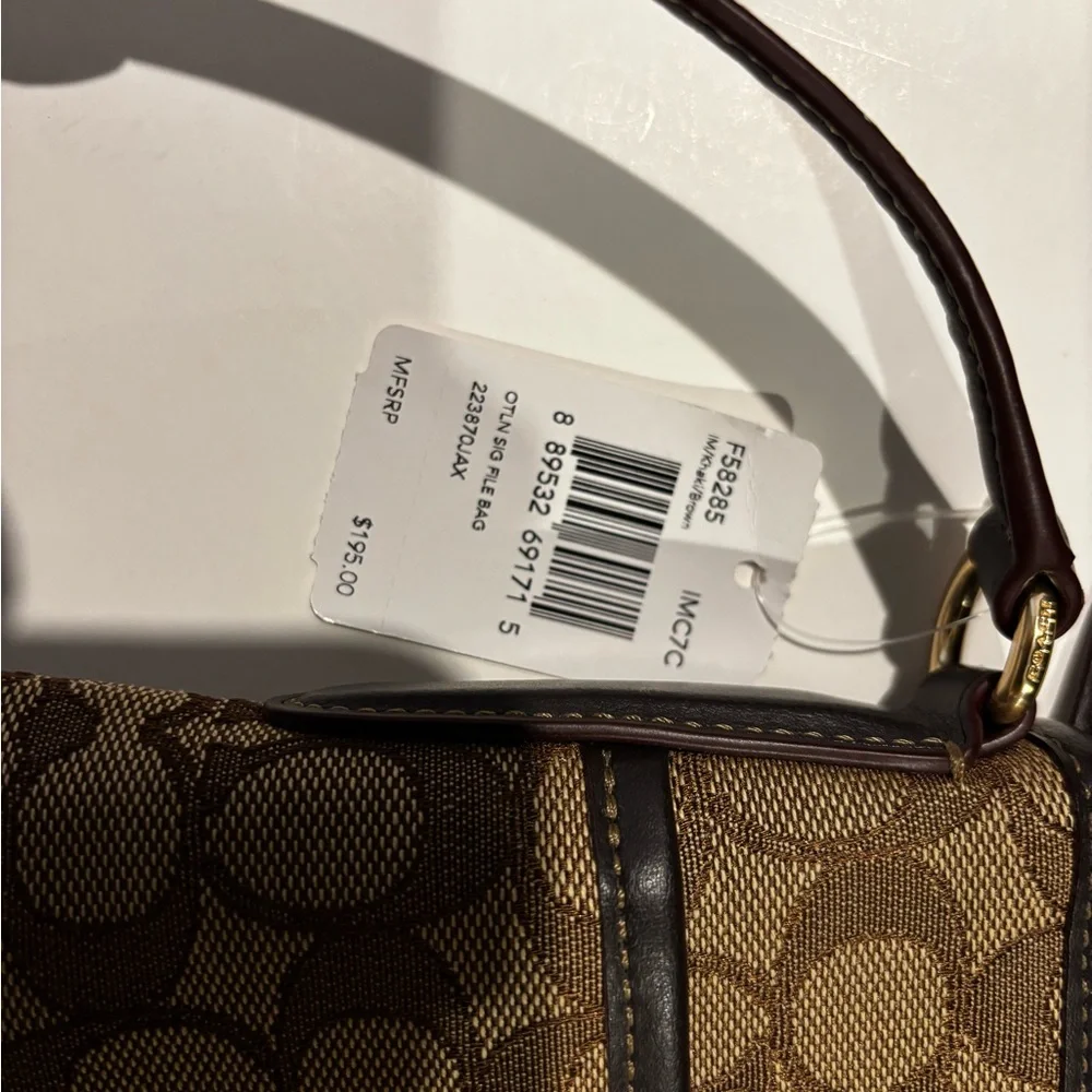 Coach Signature File Bag - Style F58285
Classic Khaki canvas with leather trim - Picture 6 of 6